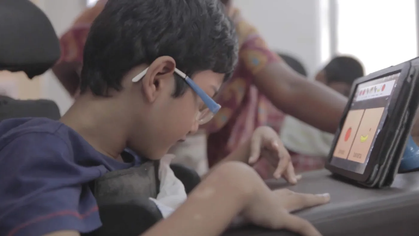 A student using Avaz in a classroom at Vidyasagar